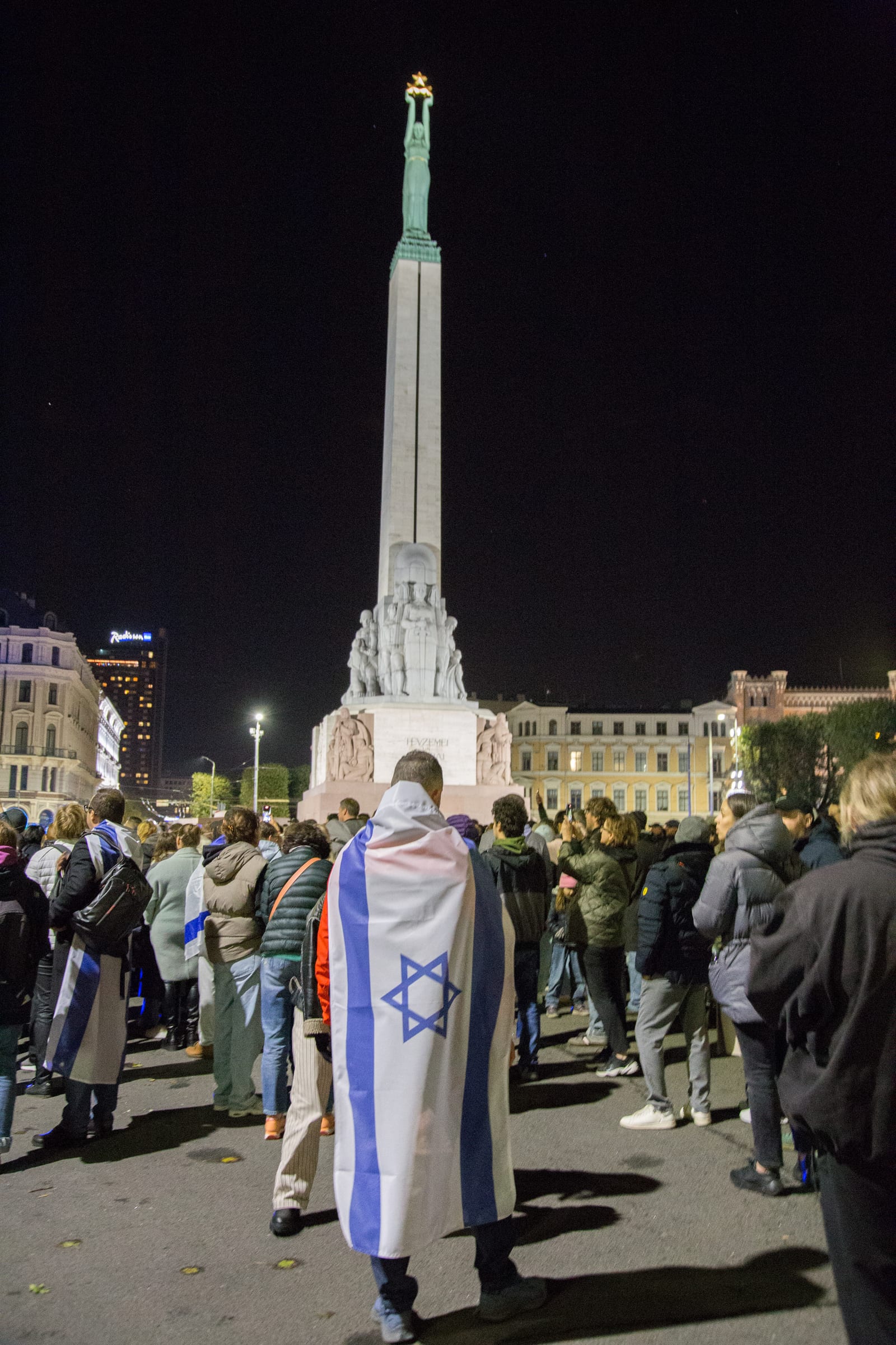Solidarity rally at the Freedom Monument in Riga with Israeli flags